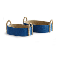 Two woven baskets with blue exterior and natural interior on a white background
