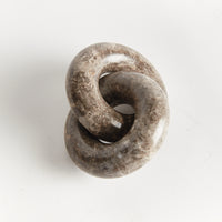 Stone knot on a white background