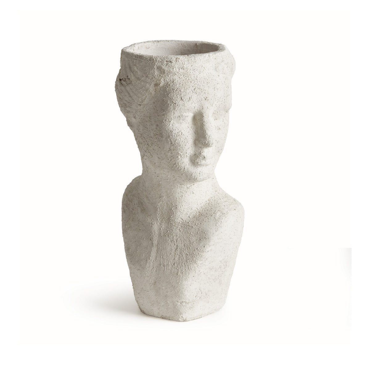 Cement sculpture of a face on a white background