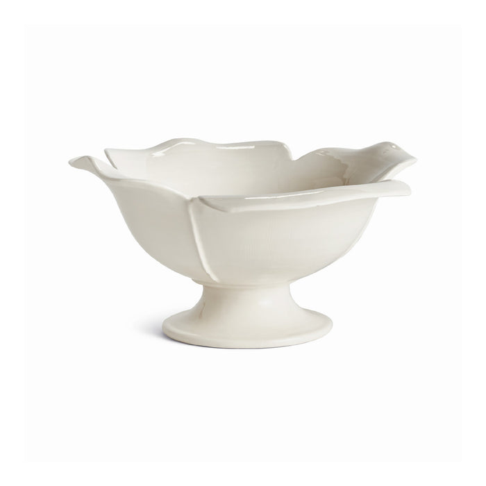 White ceramic bowl with a petal-like design on a white background
