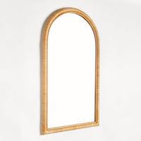 Rattan arch mirror on a white background