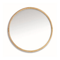 Round mirror with a rattan frame on a white background