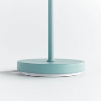 Light blue table lamp stand on a white background