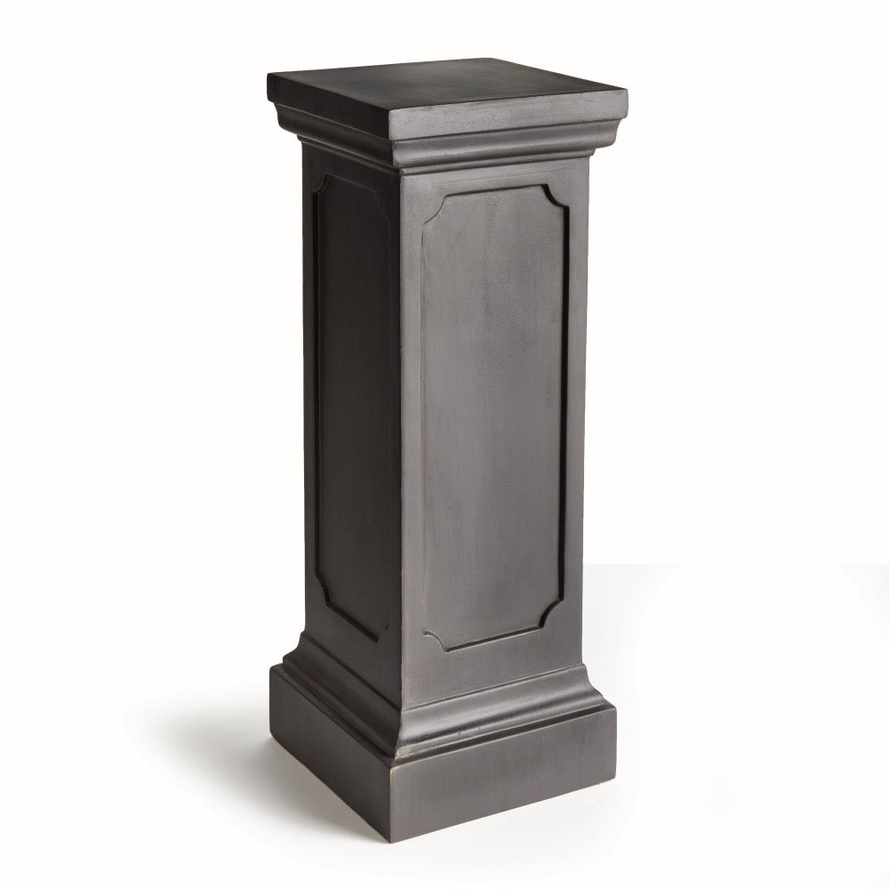 The Fibreclay Chambers Pedestal by Napa Home & Garden features a tall, rectangular form and antique black finish.