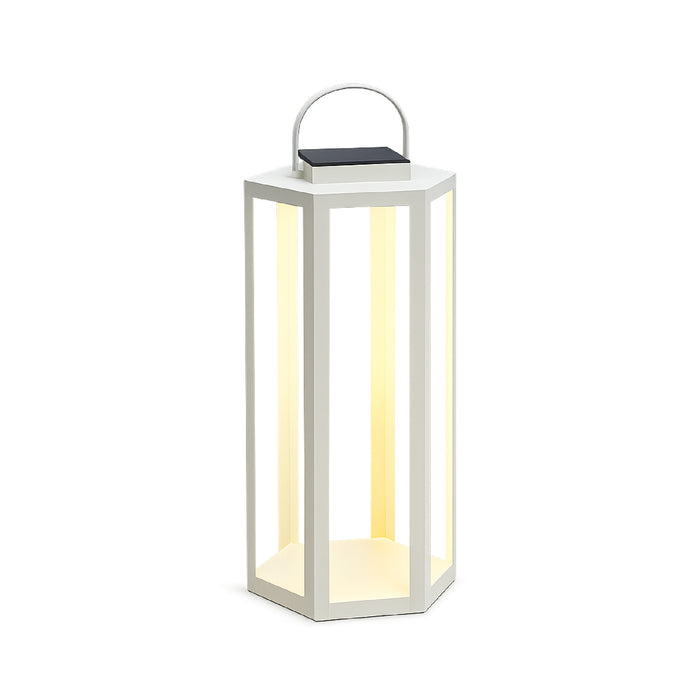White lantern with a light inside on a white background