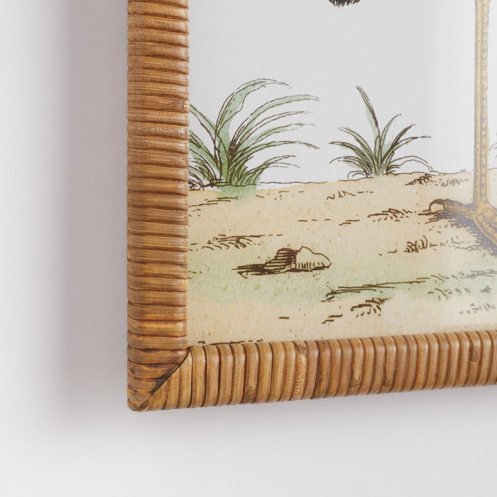 Framed artwork with a wicker frame on a white wall
