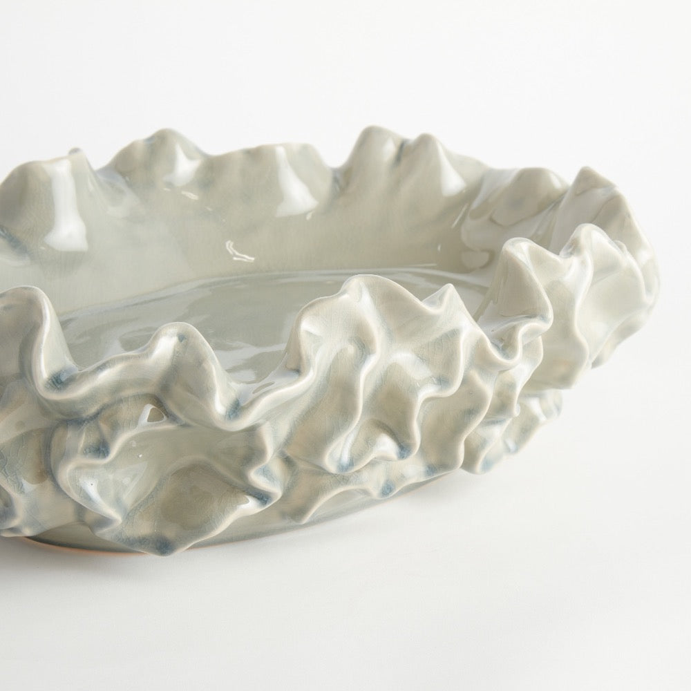 Ceramic bowl with textured surface on a white background
