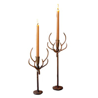 rust metal deer taper candle holder pair