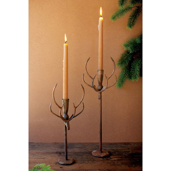 rust metal deer taper candle holder pair