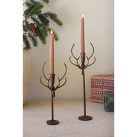 rust metal deer taper candle holder pair