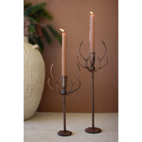 rust metal deer taper candle holder pair