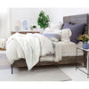 winter white throw blanket on bed