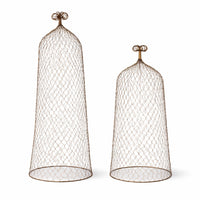 Two cone-shaped wire mesh cloche topiary on a white background