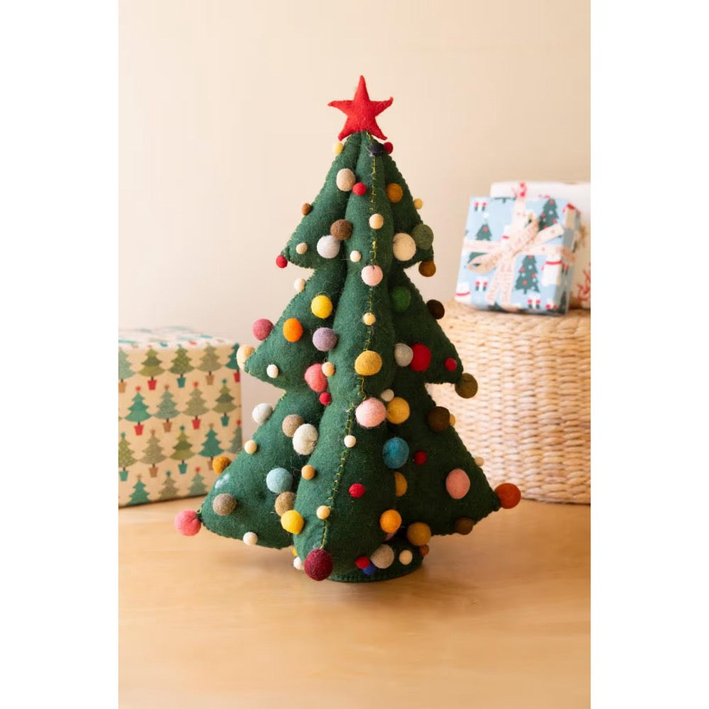 Green felt christmas tree with colored pom pom balls and wrapped presents on a beige background.