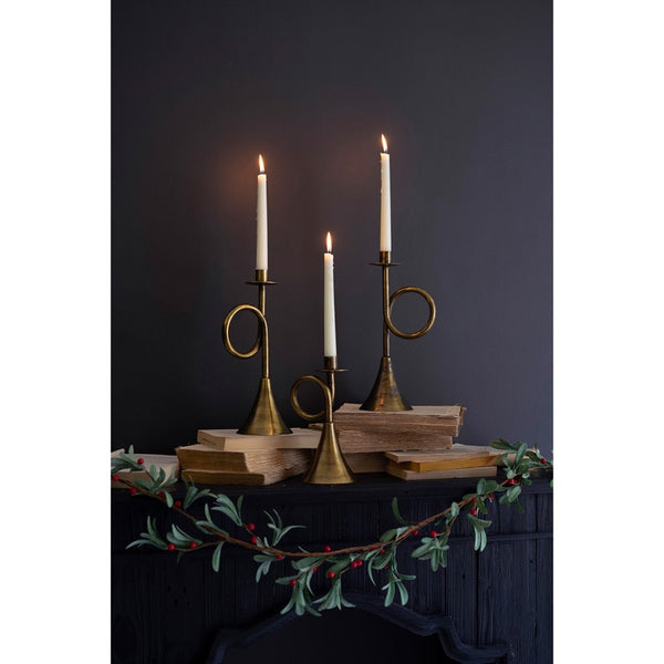 3 brass trumpet-shaped taper candle holders