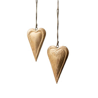 aged gold metal heart pair