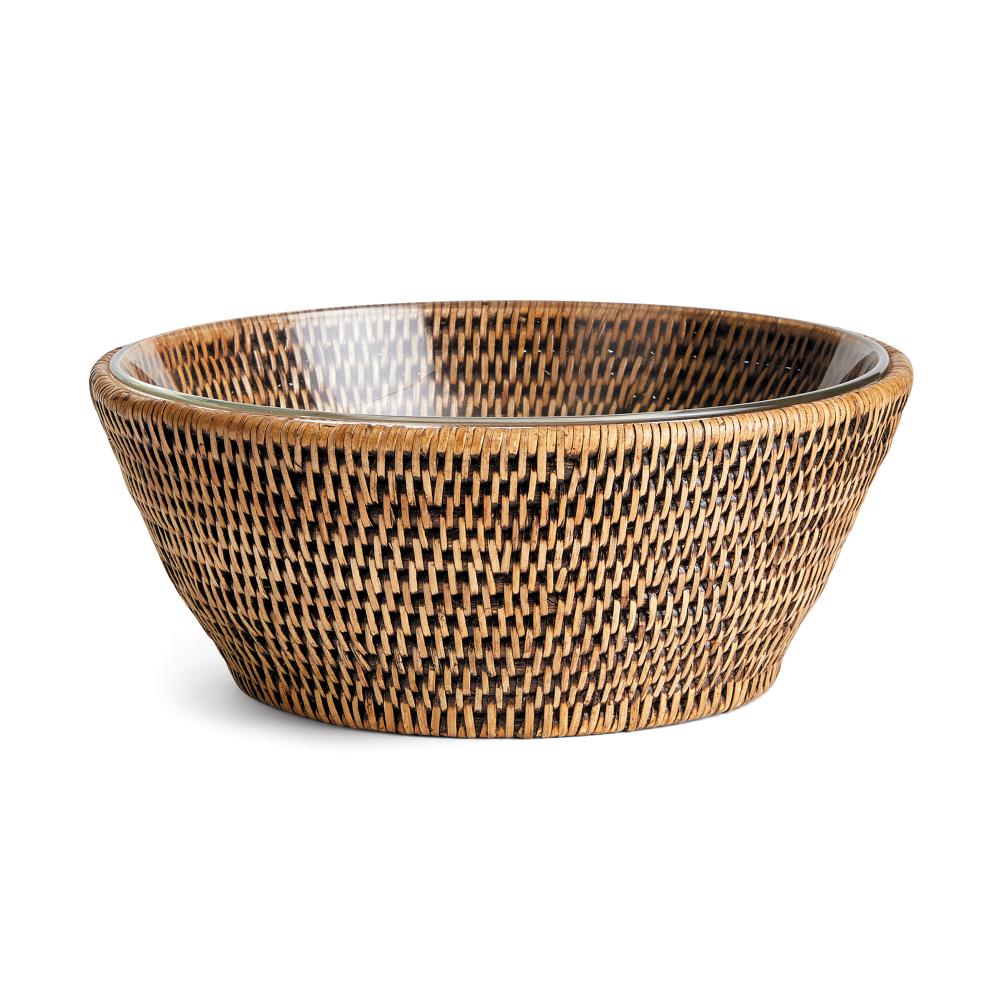 Woven rattan bowl on a white background