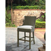 barstool brown woven curved back white seat cushion wood legs Padma's Plantation