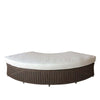 wicker brown rounded bench white cushion