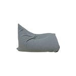 A soft, gray Lorena Canals 'Big Puff Emily' floor cushion with a relaxed shape, seen from the side.