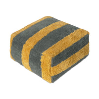 A square pouf with plush, high-pile texture featuring alternating horizontal stripes of dark gray and mustard yellow, isolated on a white background.