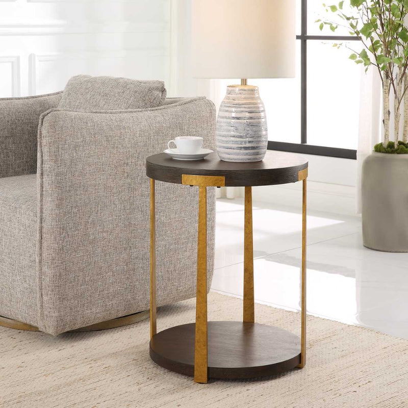 contemporary side table round walnut veneer top lower shelf antique gold columns
