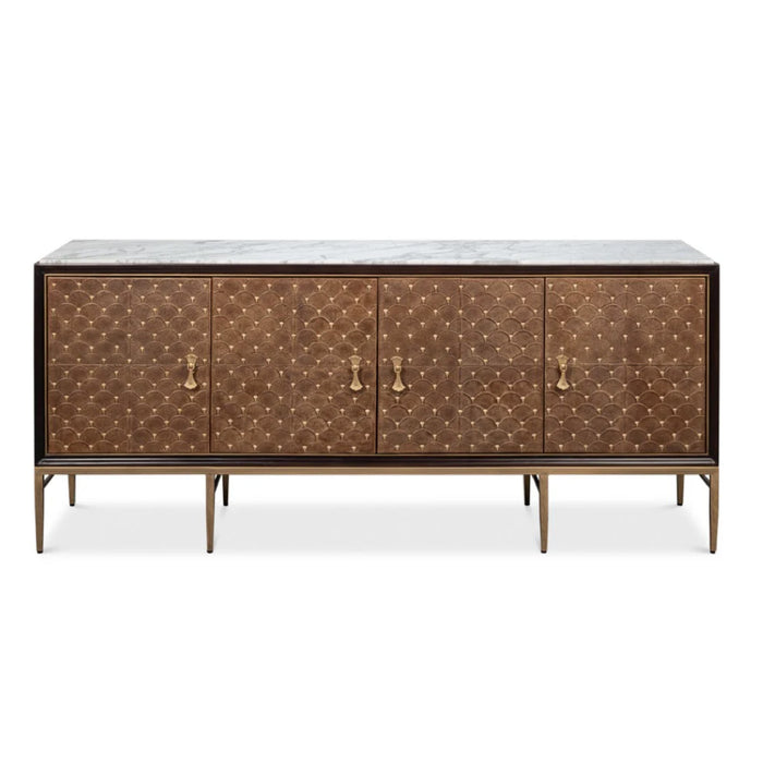 The Palisade Shagreen Credenza by Sarreid, Ltd. features 4 doors, gold handles, slim legs, and a gray Statuario marble top.