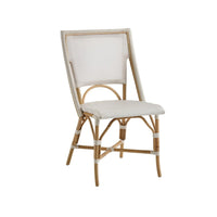 Kenian Paris Natural Bistro Chair set features rattan frames, light cushions, and white accents for casual elegance.