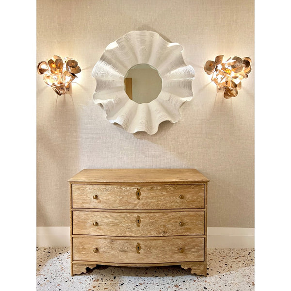 three drawer chest natural round mirror sconces on wall