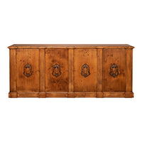 A rustic four-door wooden sideboard or credenza with a warm honey-brown finish and dark metal lion head pulls, shown against a plain white background.