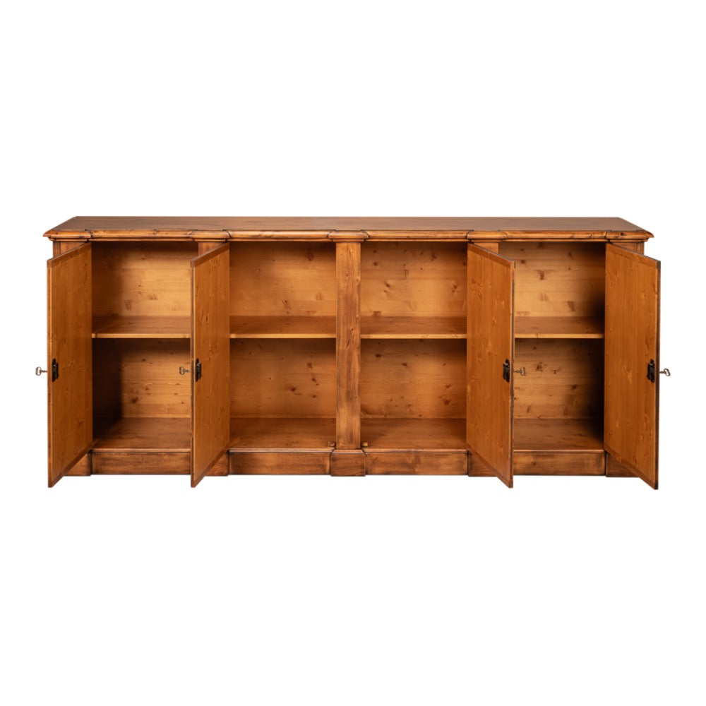 A rustic wooden sideboard cabinet with four doors, shown open to reveal three interior shelves. The cabinet is made of warm medium-brown wood with visible grain, and has small dark metal handles.
