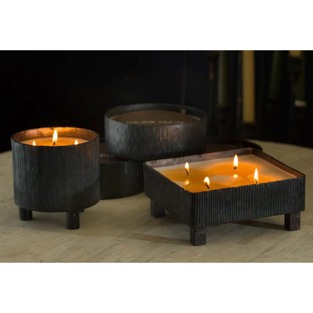 black round textured candle 4 wick 
