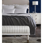 white leather bench channel stitching metal legs brass finish