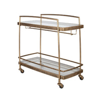 The Uttermost Scarritt Bar Cart features glass shelves, wheels, and antique brass finish—serve drinks in style.