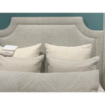 upholstered headboard pillows on bed 