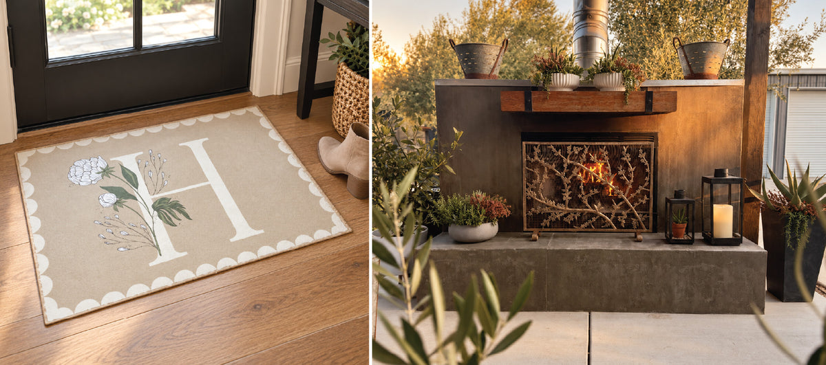 A doormat with the letter H and floral accents, next to an outdoor fireplace with a branch-patterned screen.