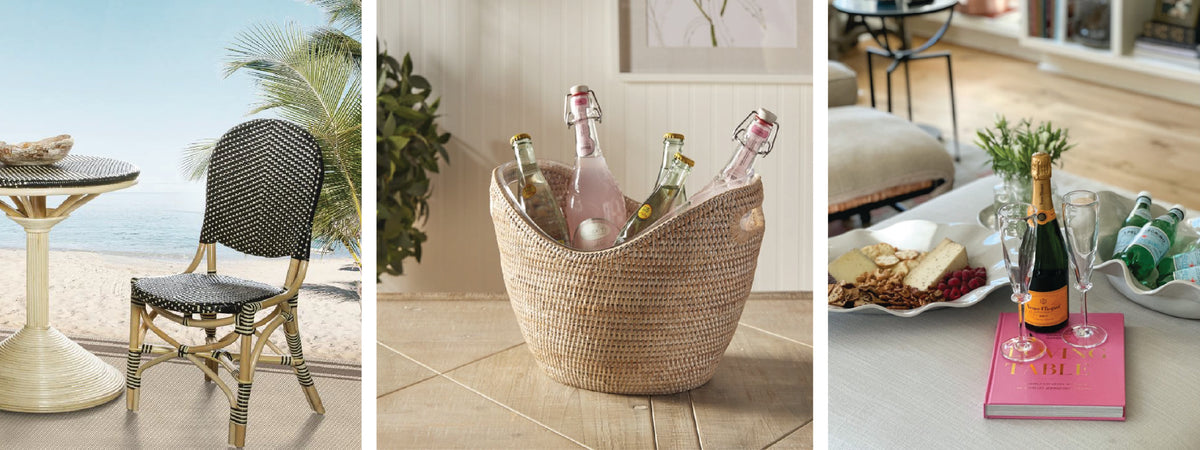 A beachside chair, a basket with bottled drinks, and a table with a book, champagne, and snacks.
