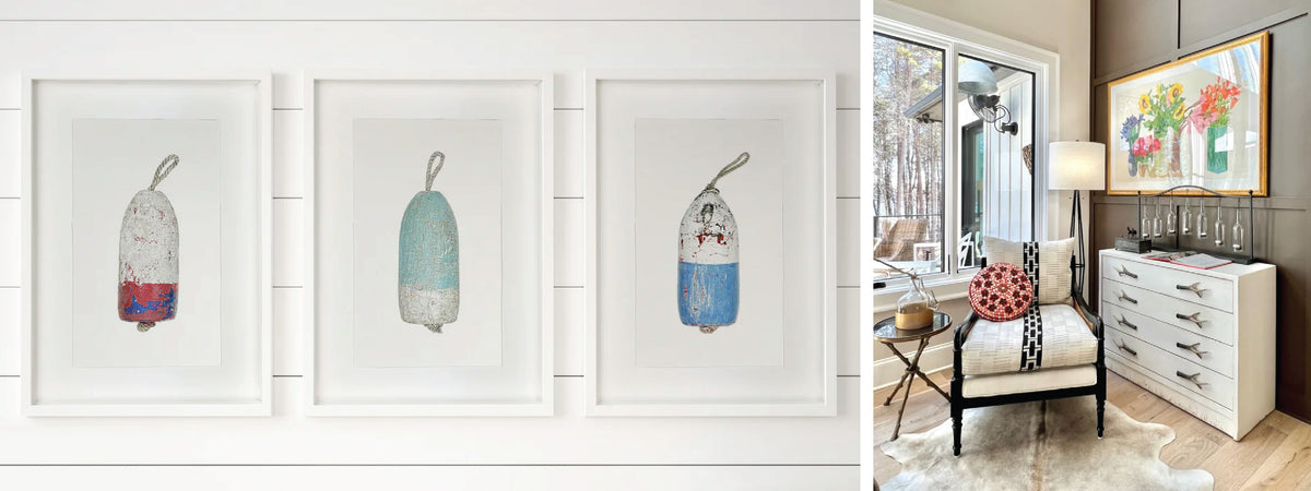 image of three framed buoys, and a white chest with antler handles next to a chair