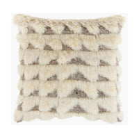 A square decorative throw pillow with a textured, layered faux-fur or sheepskin-like surface in cream and taupe, featuring a geometric chevron pattern.
