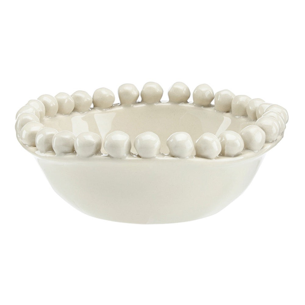 Off White ceramic bowl with bead-like embellishments on a white background