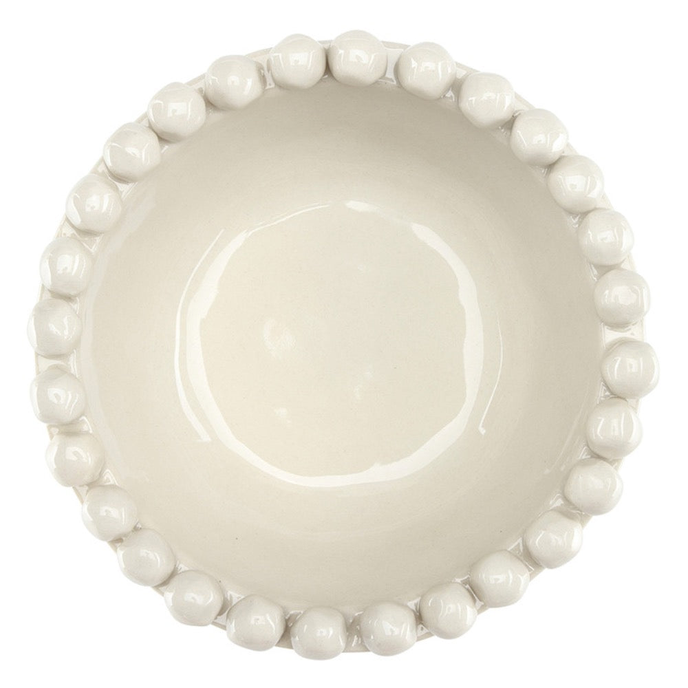 Off White ceramic bowl with bead-like embellishments on a white background
