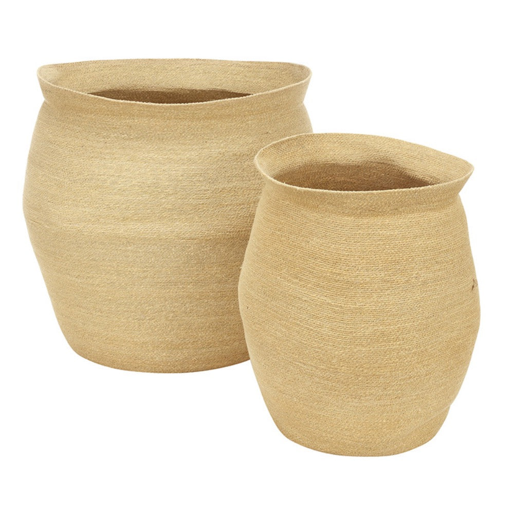 Two beige woven baskets on a white background