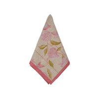 Floral patterned napkin with pink accents on a white background