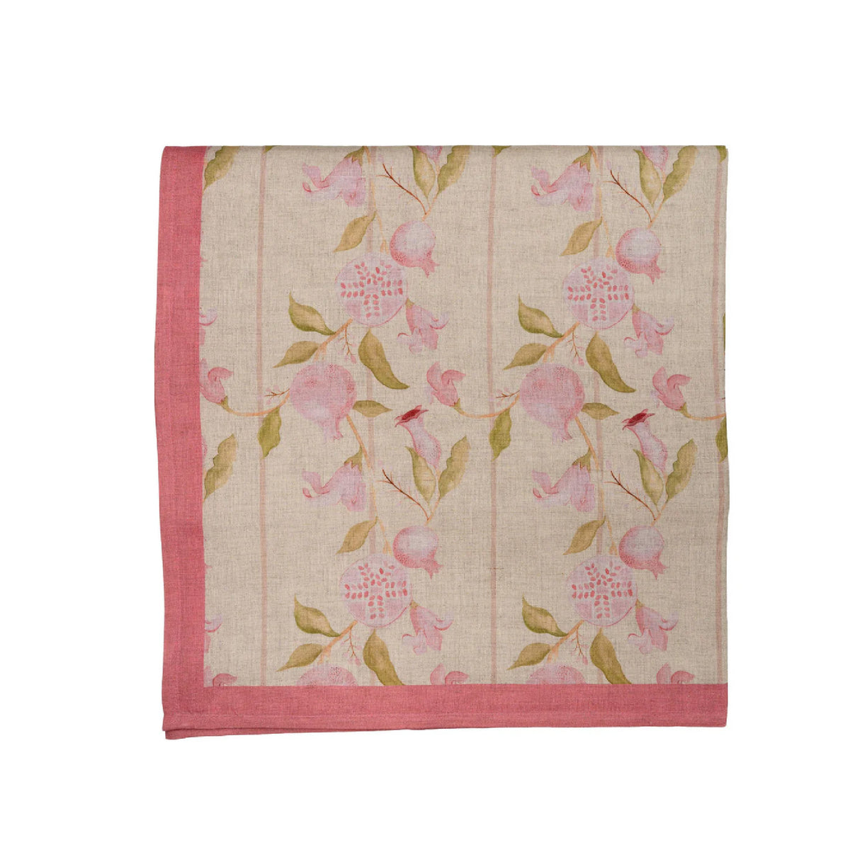 Floral patterned tablecloth with pink flowers and green leaves on a white background