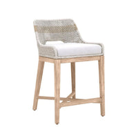 Essentials for Living Tapestry Taupe + White Counter Stool with woven rattan, white cushion, and light wood legs.