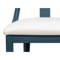 close up blue modern dining chair white cushion