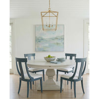 white dining table blue modern chairs, chandelier and abstract painting in background
