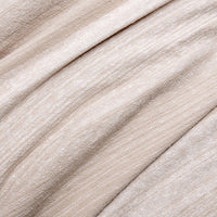 Close-up of beige fabric with a soft texture