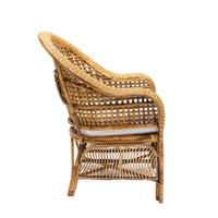 Wicker armchair with a white cushion on a white background