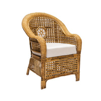 Wicker chair with a white cushion on a white background
